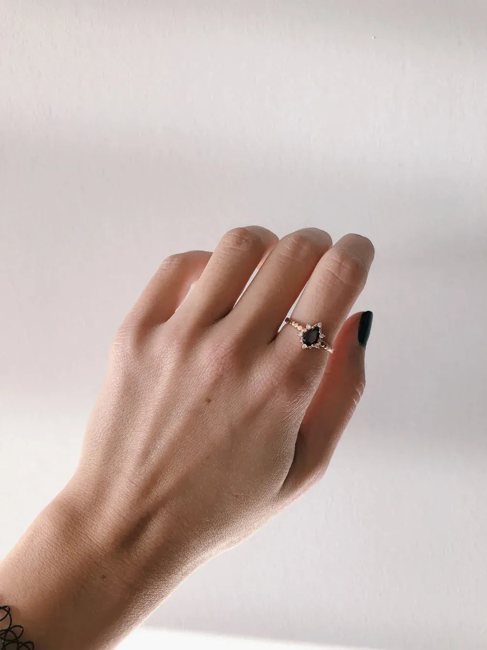 Red Garnet Jewelry Ring Worn On Woman's Hand