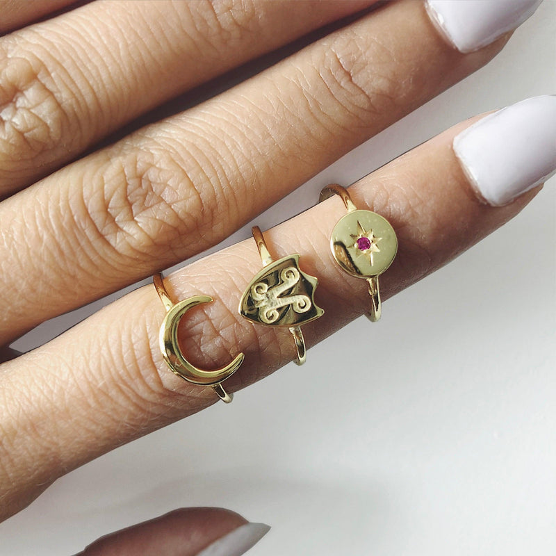Gold Moon Ring On Woman's Finger
