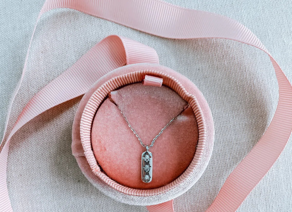 Women's necklace in a pink box