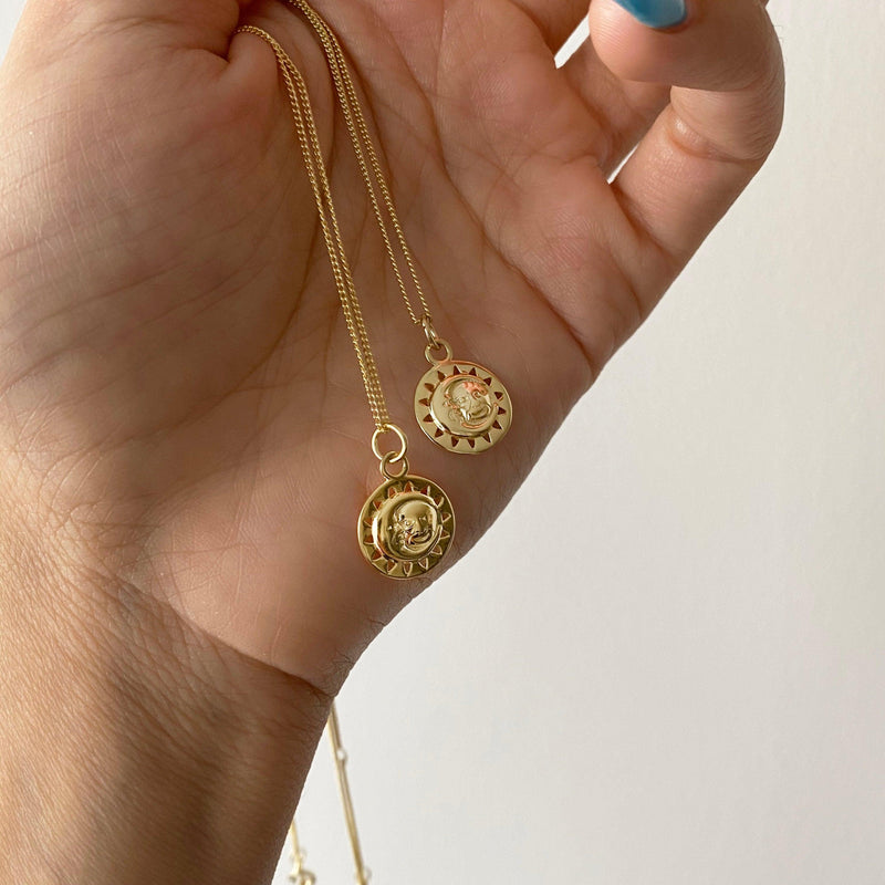 A Sun And Moon Necklace In 18K Gold Vermeil