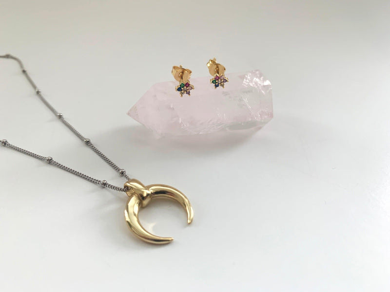Women's Rainbow Stud Earrings Alongside A Necklace