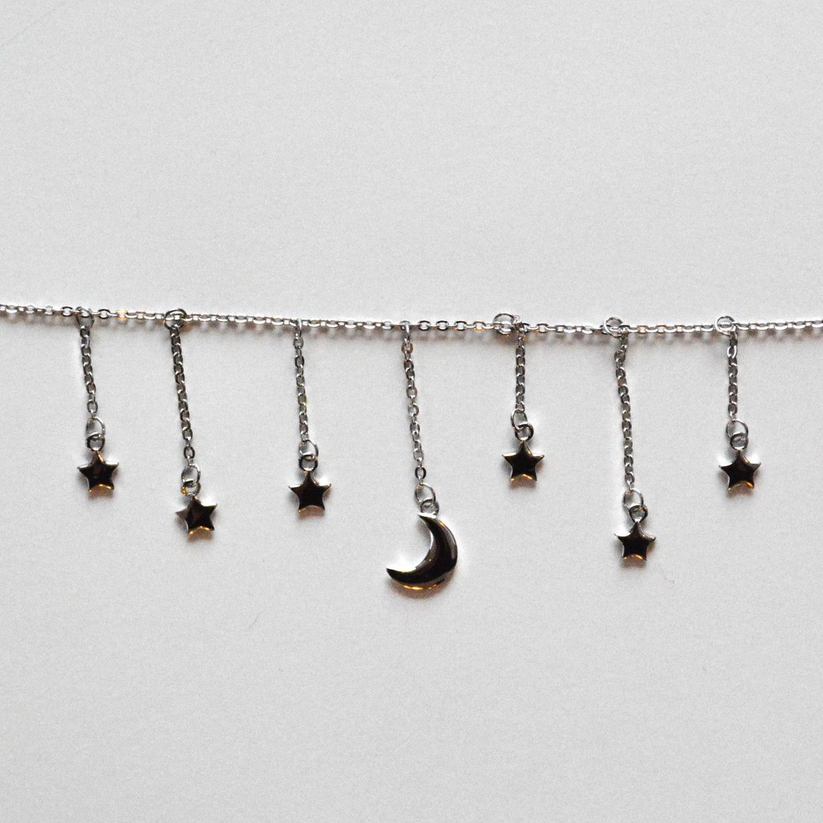 Chic Silver Choker Necklace - Elegant Design with Star & Moon Dangling Charms