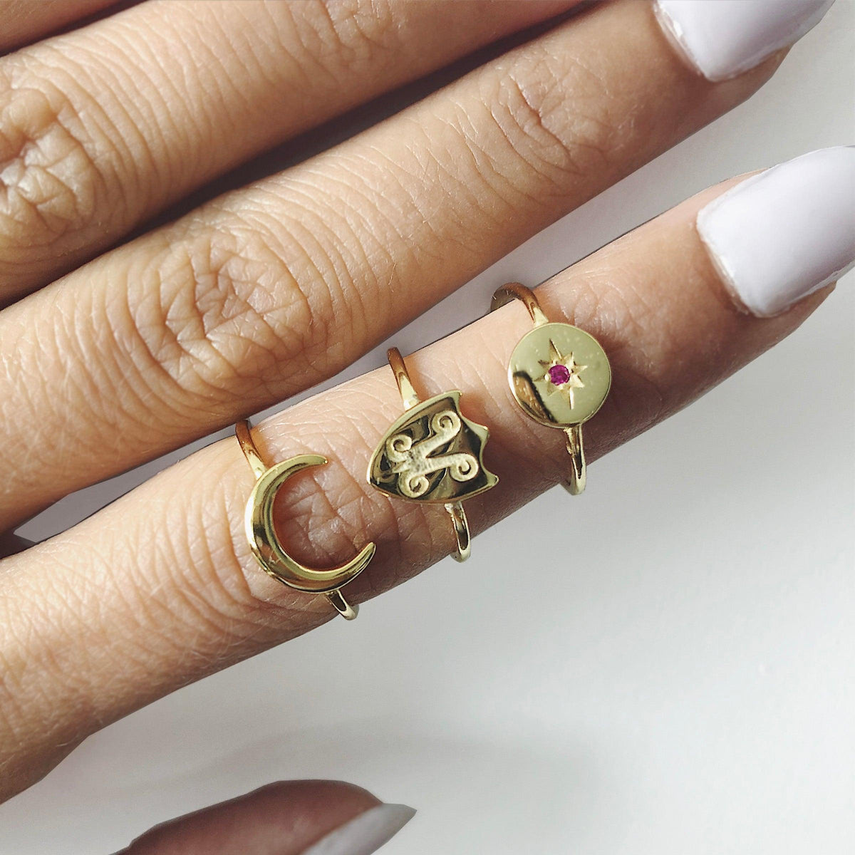 Gold Moon Ring On Woman's Finger