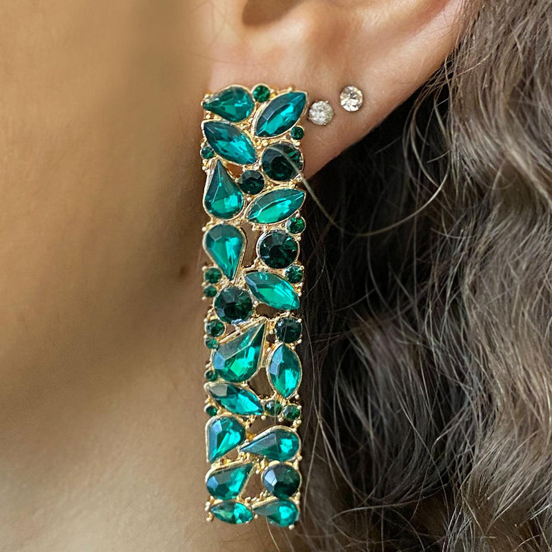 Teal Rhinestone Earrings On A Woman